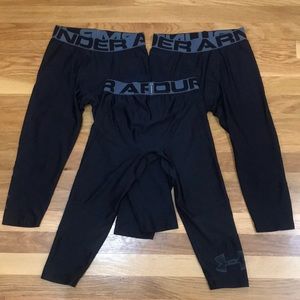 3 pairs of Under Armour coldgear base layer pants. Youth medium in black.